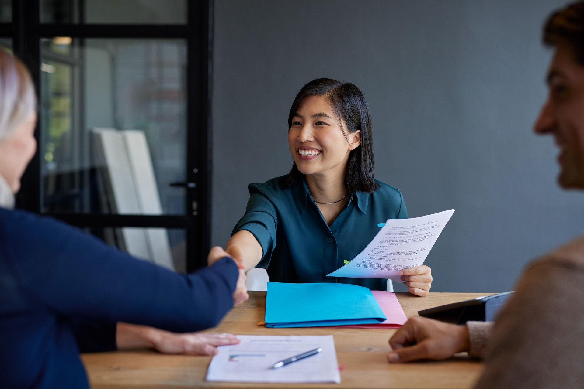 Businesswoman shaking hand after meeting